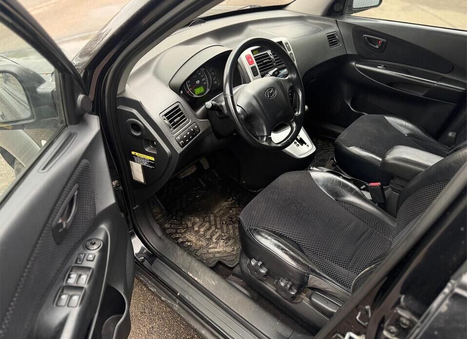 Hyundai Tucson, I 2.0 AT (141 л.с.) 4WD
