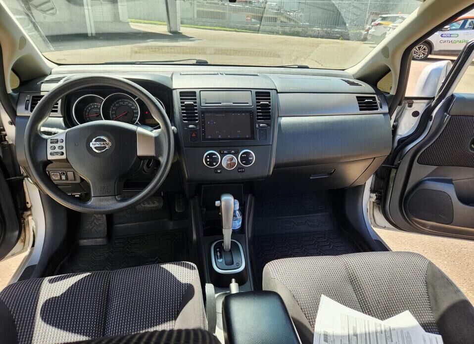 Nissan Tiida 1.6 AT (110 л.с.)