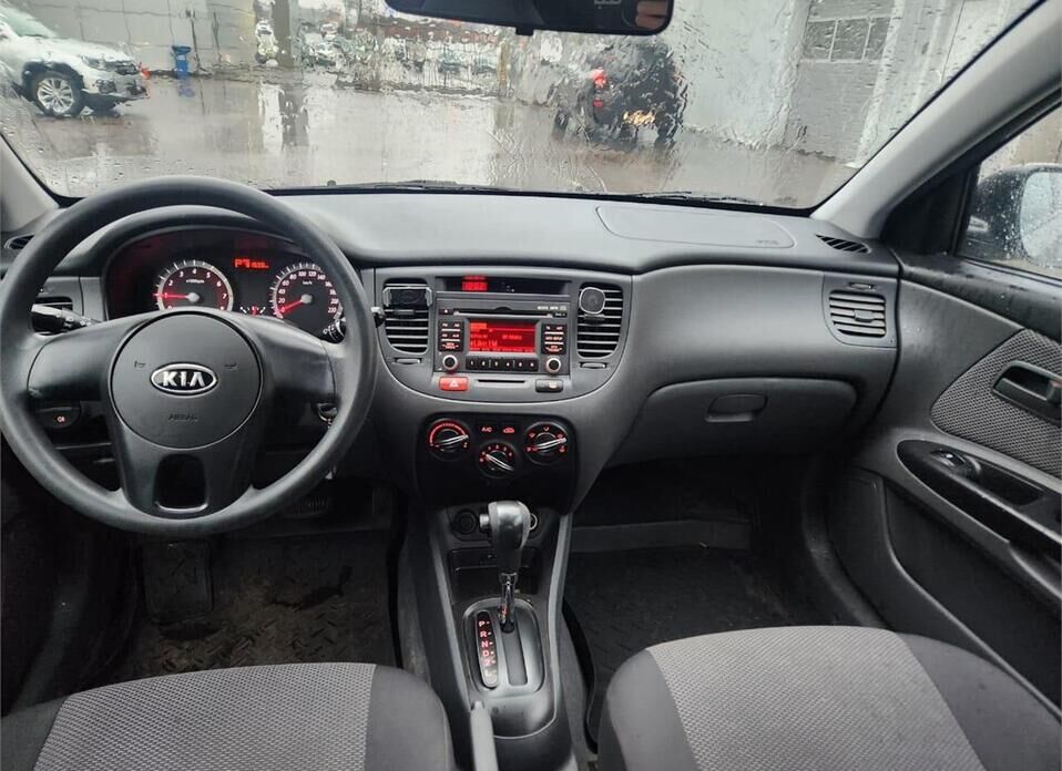 Kia Rio, II Рестайлинг 1.4 AT (95 л.с.)