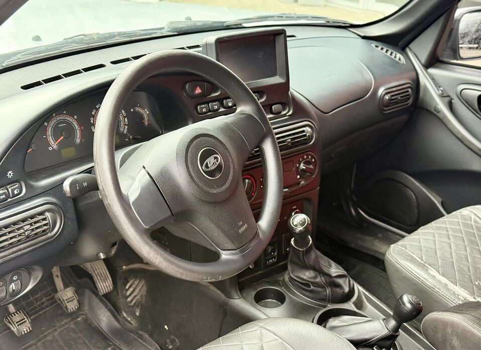 LADA (ВАЗ) Niva Travel, I 1.7 MT (80 л.с.) 4WD