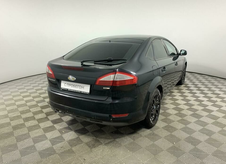 Ford Mondeo 2.0d MT (140 л.с.)