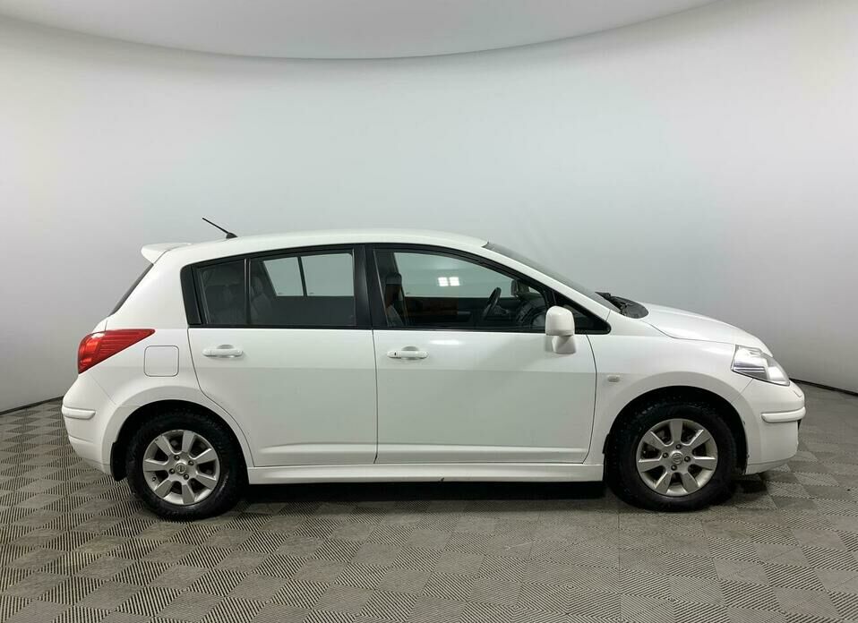 Nissan Tiida 1.6 AT (110 л.с.)