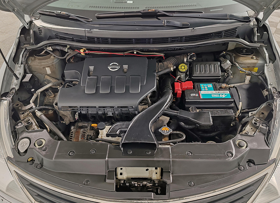 Nissan Tiida, I Рестайлинг 1.6 AT (110 л.с.)