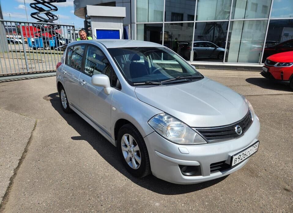Nissan Tiida 1.6 AT (110 л.с.)