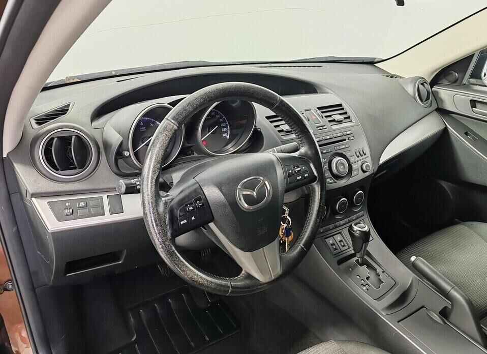 Mazda 3, II (BL) Рестайлинг 1.6 AT (105 л.с.)