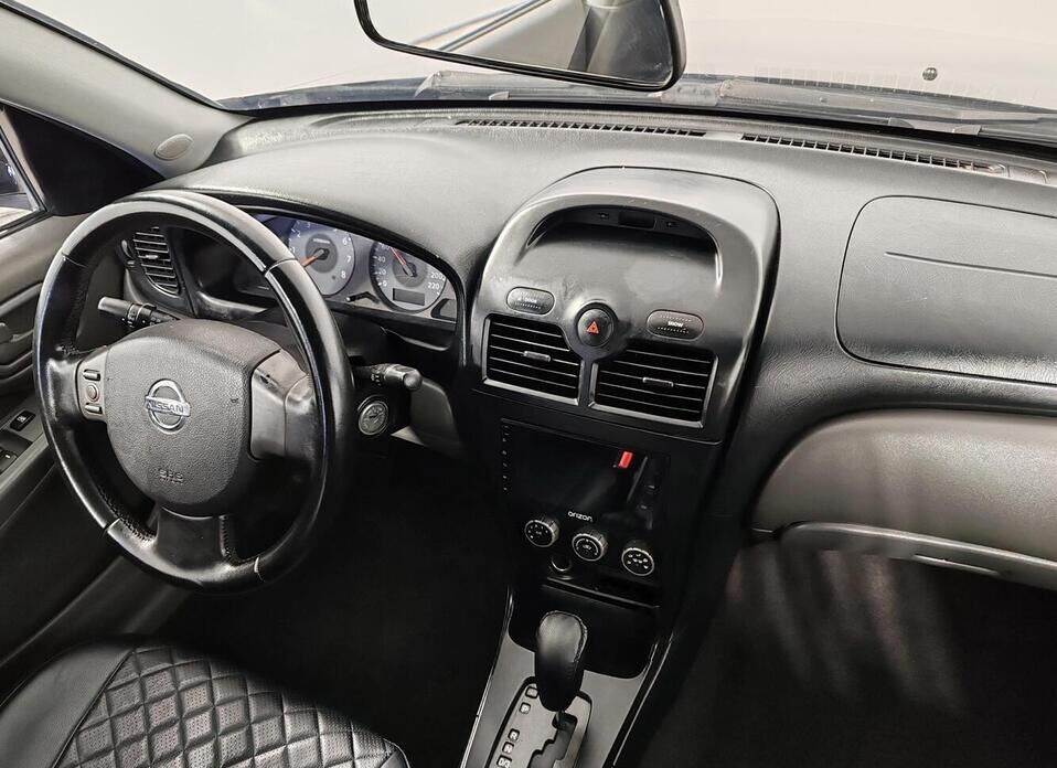 Nissan Almera Classic 1.6 AT (107 л.с.)