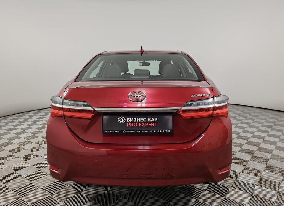 Toyota Corolla, XI (E160, E170) Рестайлинг 1 1.6 CVT (122 л.с.)