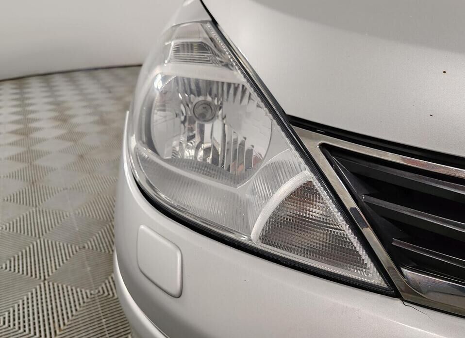 Nissan Tiida 1.6 AT (110 л.с.)