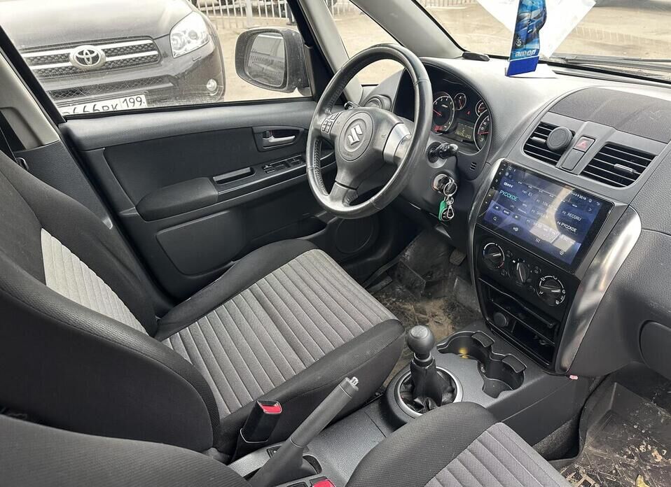 Suzuki SX4, I (Classic) Рестайлинг 1.6 MT (112 л.с.)