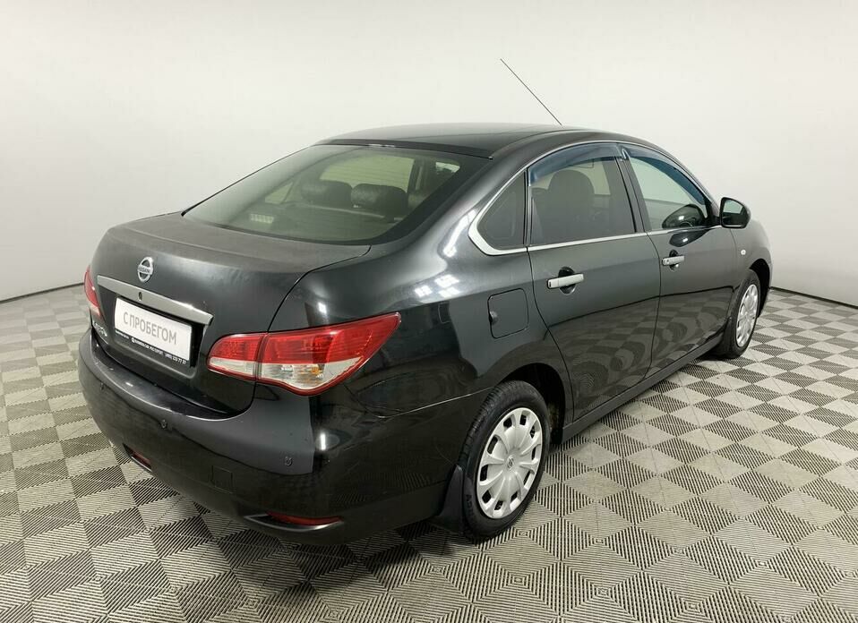 Nissan Almera 1.6 AT (102 л.с.)