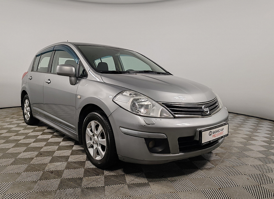 Nissan Tiida, I Рестайлинг 1.6 AT (110 л.с.)
